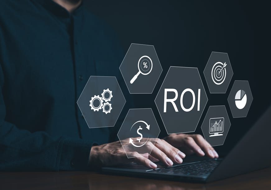 Analyzing Return on Investment ROI on Laptop