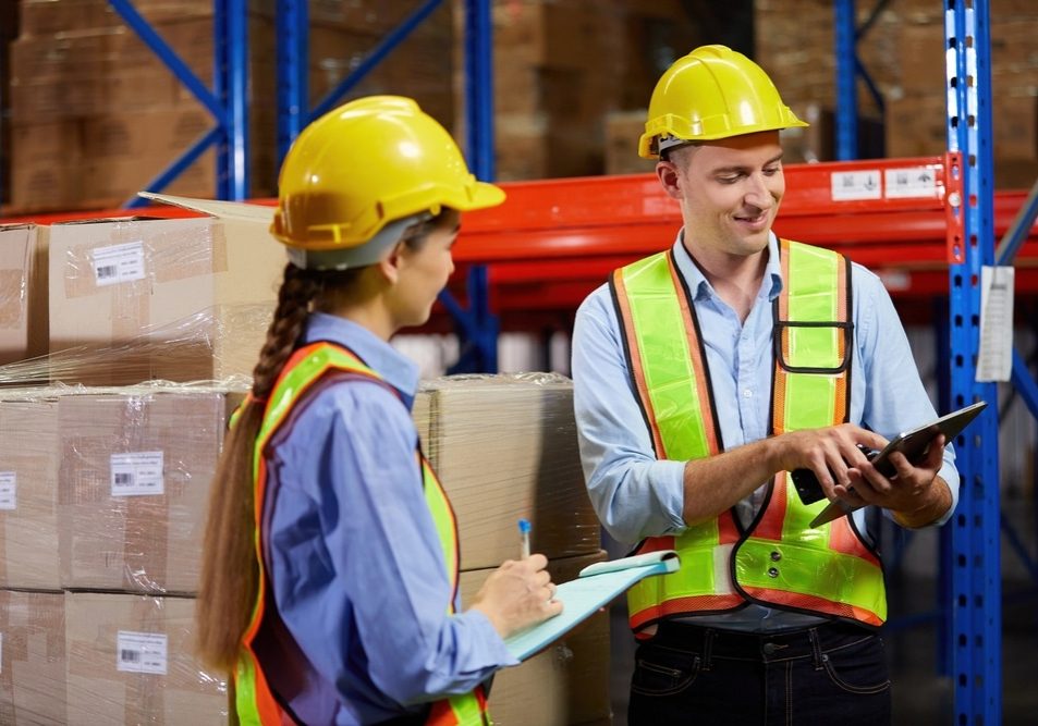 workers working and checking corrugated box in the warehouse storage workers working and checking corrugated box in the warehouse storage