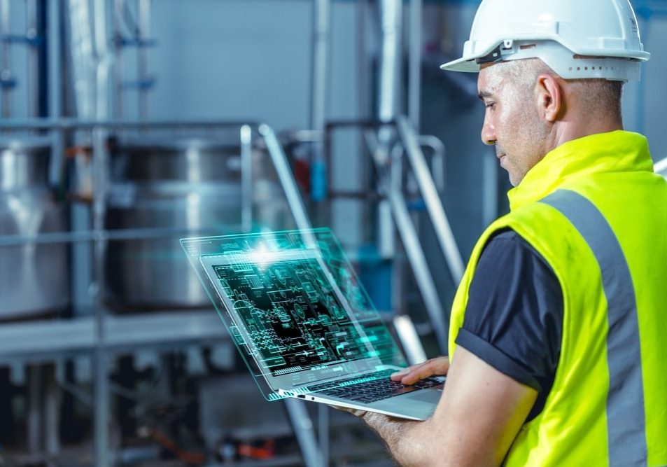 Smart,Engineer,Worker,Using,Software,On,Laptop,To,Monitor,Check Smart engineer worker using software on laptop to monitor check factory boiler pipe valve control system