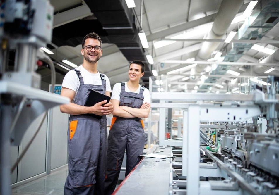 production line workers controlling manufacturing process of modern packaging production line workers controlling manufacturing process of modern packaging