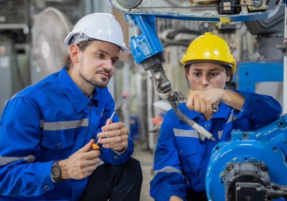 Two,Professional,Engineer,worker,technician,Use,Clipboard,Discuss,Work,,Walk,In,Steel two professional engineer