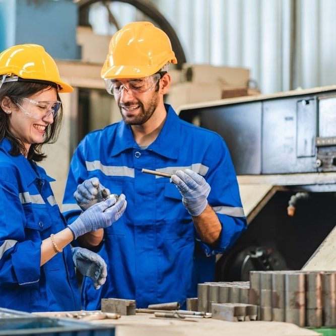 technician wearing safety helmet working to maintenance service