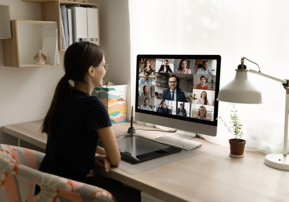 Back,Rear,View,Happy,Millennial,Female,Employee,Looking,At,Computer Back rear view happy millennial female employee looking at computer monitor.